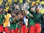 Cameroon's midfielder #22 Olivier Ntcham (R) and teammates celebrate on the pitch after the Qatar 2022 World Cup Group G Cameroon's midfielder #22 Olivier Ntcham (R) and teammates celebrate on the pitch after the Qatar 2022 World Cup Group G
