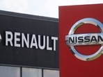 The logos of car manufacturers Nissan and Renault are pictured at a dealership. (Reuters)