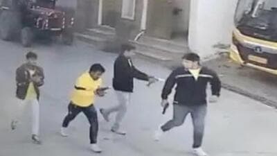 Four miscreants, wearing coaching institute uniforms can been seen with guns (Twitter/Screengrab) Four miscreants, wearing coaching institute uniforms can been seen with guns (Twitter/Screengrab)