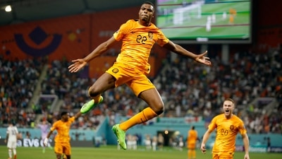 Netherlands' Denzel Dumfries celebrates scoring Netherlands' third goal. (REUTERS)