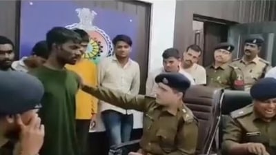Durg SP Dr Abhishek Pallava interrogating the thief who claimed he regretted after stealing. (Screenshot from viral video)