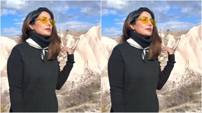 Hina decked up in a black full-sleeves sweater featuring turtle neck details, and cut details below the waist. (Instagram/@realhinakhan) Hina decked up in a black full-sleeves sweater featuring turtle neck details, and cut details below the waist. (Instagram/@realhinakhan)