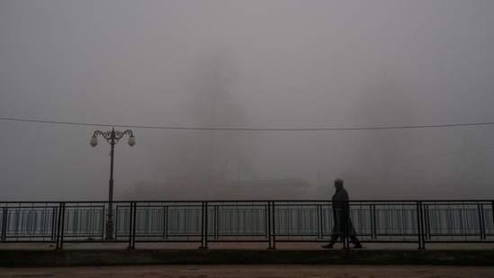 "The weather is not good it's difficult to drive vehicles. We have to use indicator lights beside headlights for better visibility. It will get colder as the days progress," said another local.(AP)