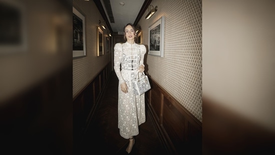 Manushi Chhillar opted for the soft glam makeup look and tied her hair in a bun with a few waved strands framing her face.(Instagram/@manushi_chhillar)