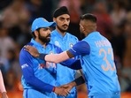 Rohit Sharma shakes hands with teammate Hardik Pandya, right, following a T20 World Cup match(AP) Rohit Sharma shakes hands with teammate Hardik Pandya, right, following a T20 World Cup match(AP)