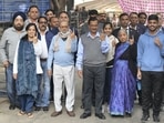 Delhi Chief Minister and Aam Aadmi Party (AAP) Convener Arvind Kejriwal and his family members cast their votes for the Municipal Corporation of Delhi (MCD) elections at a polling station in Civil Lines area in New Delhi.(PTI)