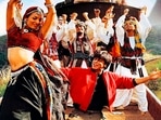 Malaika Arora and Shah Rukh Khan dance on top of a train in Chaiyya Chaiyya. Malaika Arora and Shah Rukh Khan dance on top of a train in Chaiyya Chaiyya.