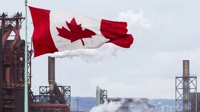 Canada Open Work Permit: A Canada flag flies in Hamilton, Ontario. (File) Canada Open Work Permit: A Canada flag flies in Hamilton, Ontario. (File)