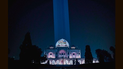 India's G20 logo is projected on the dome of illuminated Humayun’s tomb in Delhi. (AFP) India's G20 logo is projected on the dome of illuminated Humayun’s tomb in Delhi. (AFP)