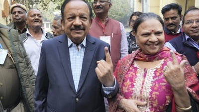 Bharatiya Janata Party (BJP) MP Harsh Vardhan shows his finger marked with indelible ink after casting his vote for the MCD elections at a polling station in Krishna Nagar area in East Delhi. (PTI) Bharatiya Janata Party (BJP) MP Harsh Vardhan shows his finger marked with indelible ink after casting his vote for the MCD elections at a polling station in Krishna Nagar area in East Delhi. (PTI)