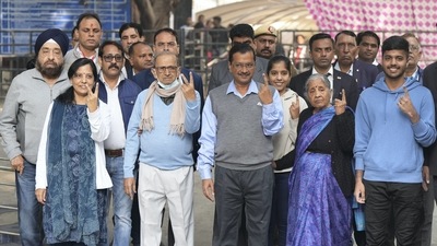 Delhi Chief Minister and Aam Aadmi Party (AAP) Convener Arvind Kejriwal and his family members cast their votes for the Municipal Corporation of Delhi (MCD) elections at a polling station in Civil Lines area in New Delhi. (PTI) Delhi Chief Minister and Aam Aadmi Party (AAP) Convener Arvind Kejriwal and his family members cast their votes for the Municipal Corporation of Delhi (MCD) elections at a polling station in Civil Lines area in New Delhi. (PTI)