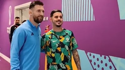 Screengrab of Australia player posing for photograph with Lionel Messi (twitter) Screengrab of Australia player posing for photograph with Lionel Messi (twitter)