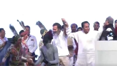 Rahul Gandhi took part in the tribal dance as Ashok Gehlot and others held hands to join the dance. (ANI)