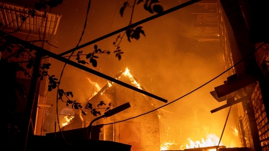 Russia-Ukraine War: A house burns after a Russian attack in Kherson, Ukraine.(AP) Russia-Ukraine War: A house burns after a Russian attack in Kherson, Ukraine.(AP)