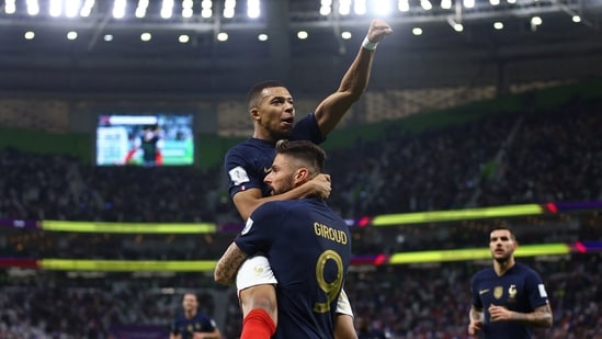 France's Olivier Giroud celebrates scoring their first goal with teammate Kylian Mbappe(REUTERS)
