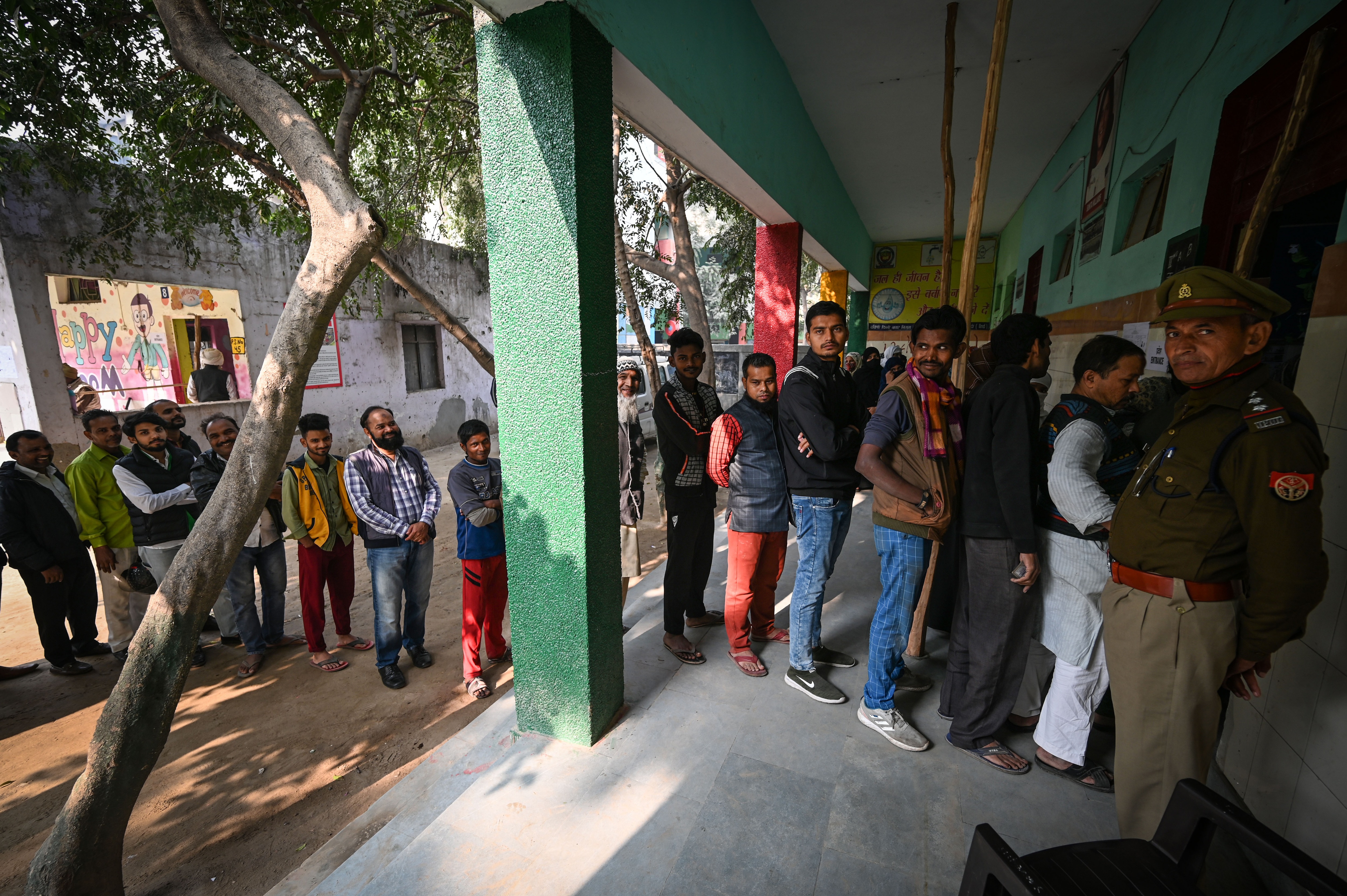 Voters seen standing in queues to cast their vote inside a polling booth made in a government school at Zakir Nagar for the MCD elections 2022 in New Delhi, India, on Sunday, December 4, 2022. (Photo by Sanchit Khanna/Hindustan Times) (Hindustan Times) Voters seen standing in queues to cast their vote inside a polling booth made in a government school at Zakir Nagar for the MCD elections 2022 in New Delhi, India, on Sunday, December 4, 2022. (Photo by Sanchit Khanna/Hindustan Times) (Hindustan Times)