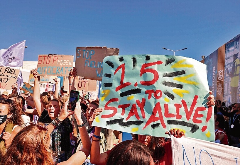 Climate activists take part in a protest inside the Sharm el-Sheikh International Convention Centre, during the COP27 summit. (AFP) Climate activists take part in a protest inside the Sharm el-Sheikh International Convention Centre, during the COP27 summit. (AFP)