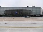 A photograph taken on December 3, 2022 shows an outside view of the newly-built extension of the Terminal 1 building. A photograph taken on December 3, 2022 shows an outside view of the newly-built extension of the Terminal 1 building.