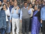 New Delhi: Delhi Chief Minister and AAP Convener Arvind Kejriwal and his family members show their fingers marked with indelible ink after casting their votes for the Municipal Corporation of Delhi (MCD) elections. (PTI) New Delhi: Delhi Chief Minister and AAP Convener Arvind Kejriwal and his family members show their fingers marked with indelible ink after casting their votes for the Municipal Corporation of Delhi (MCD) elections. (PTI)