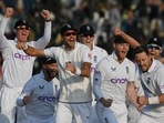 England's players celebrate after the dismissal of Pakistan's Salman Ali Agha (not pictured) during the fifth and final day of the first cricket Test match between Pakistan and England England's players celebrate after the dismissal of Pakistan's Salman Ali Agha (not pictured) during the fifth and final day of the first cricket Test match between Pakistan and England