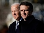 French President Emmanuel Macron and US President Joe Biden are seen. 
