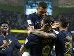 FIFA World Cup 2022: Kylian Mbappe celebrates with Oliver Giroud.