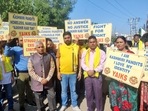 An organisation of Kashmiri Pandits stages a demonstration seeking justice.(ANI / File) An organisation of Kashmiri Pandits stages a demonstration seeking justice.(ANI / File)
