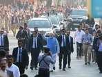 Prime Minister Narendra Modi gestures as he arrives to cast his vote for the second phase of the Gujarat state assembly election in Ahmedabad on December 5, 2022.(AFP)