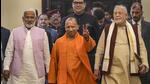 Uttar Pradesh chief minister Yogi Adityanath flanked by ministers Swatantra Dev Singh and Suresh Khanna on the first day of the winter session of the state assembly where the supplementary budget was presented. (PTI PHOTO) Uttar Pradesh chief minister Yogi Adityanath flanked by ministers Swatantra Dev Singh and Suresh Khanna on the first day of the winter session of the state assembly where the supplementary budget was presented. (PTI PHOTO)