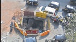 Mumbai, India - December 03, 2022: East to West traffic was slow as a metal manhole cover collapsed after a dumper truck drove over it, at Tiwari Chowk, Andheri, in Mumbai, India, on Saturday, December 03, 2022. (Photo by Vijay Bate/HT Photo) (HT PHOTO) Mumbai, India - December 03, 2022: East to West traffic was slow as a metal manhole cover collapsed after a dumper truck drove over it, at Tiwari Chowk, Andheri, in Mumbai, India, on Saturday, December 03, 2022. (Photo by Vijay Bate/HT Photo) (HT PHOTO)