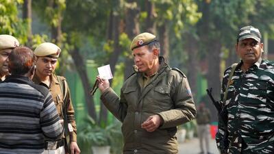 Police officers guard ballot boxes after the Municipal Corporation of Delhi elections in New Delhi. (PTI) Police officers guard ballot boxes after the Municipal Corporation of Delhi elections in New Delhi. (PTI)