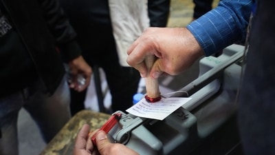 New Delhi: A poll official prepares to seal EVMs after end of voting for the Municipal Corporation of Delhi (MCD) elections, at a polling station in Old Delhi, Sunday, Dec. 4, 2022. (PTI Photo/Arun Sharma) (PTI12_04_2022_000303B) (PTI) (HT_PRINT) New Delhi: A poll official prepares to seal EVMs after end of voting for the Municipal Corporation of Delhi (MCD) elections, at a polling station in Old Delhi, Sunday, Dec. 4, 2022. (PTI Photo/Arun Sharma) (PTI12_04_2022_000303B) (PTI) (HT_PRINT)