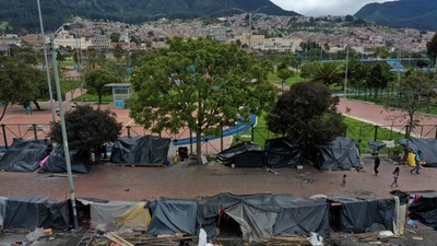Colombia Landslide: Crews were searching for people riding on a bus and a motorcycle that were caught up in the accident. (AFP File) Colombia Landslide: Crews were searching for people riding on a bus and a motorcycle that were caught up in the accident. (AFP File)