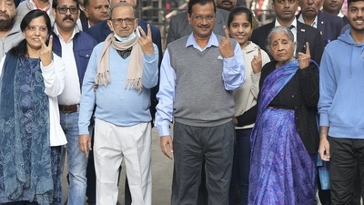 New Delhi: Delhi Chief Minister and AAP Convener Arvind Kejriwal and his family members show their fingers marked with indelible ink after casting their votes for the Municipal Corporation of Delhi (MCD) elections. (PTI)