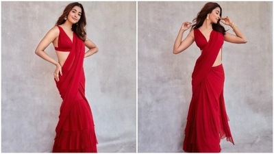 Pooja Hegde's red tiered saree and bralette is for the minimal and lowkey brides. (Instagram) Pooja Hegde's red tiered saree and bralette is for the minimal and lowkey brides. (Instagram)