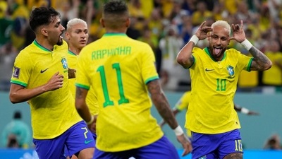 Brazil's Neymar, right, celebrates with team mates after scoring his side's second goal (AP) Brazil's Neymar, right, celebrates with team mates after scoring his side's second goal (AP)