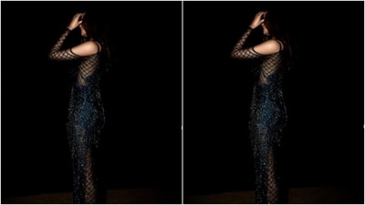 Manushi decked up in a sheer shimmery royal blue gown featuring slip details and embellishments in silver resham threads. (Instagram/@manushi_chhillar)