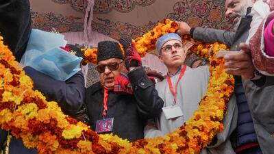 National Conference president Farooq Abdullah and vice-president Omar Abdullah being garlanded in Srinagar on Monday. (PTI) National Conference president Farooq Abdullah and vice-president Omar Abdullah being garlanded in Srinagar on Monday. (PTI)