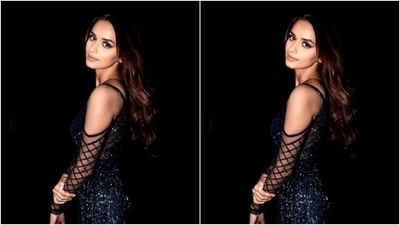 In classic black stilettos, Manushi wore her tresses open in wavy curls with a middle part as she posed for the cameras. (Instagram/@manushi_chhillar)