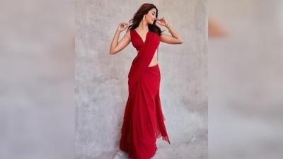 Pooja Hegde's saree comes in a clean solid shade and features ruffle detailing below the hips. (Instagram/@hegdepooja) Pooja Hegde's saree comes in a clean solid shade and features ruffle detailing below the hips. (Instagram/@hegdepooja)