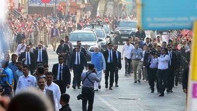 Prime Minister Narendra Modi gestures as he arrives to cast his vote for the second phase of the Gujarat state assembly election in Ahmedabad on December 5, 2022. (AFP) Prime Minister Narendra Modi gestures as he arrives to cast his vote for the second phase of the Gujarat state assembly election in Ahmedabad on December 5, 2022. (AFP)