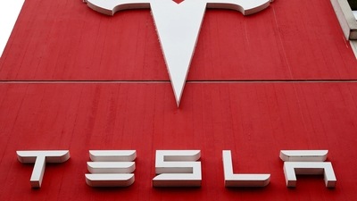 The logo of car manufacturer Tesla is seen. (Reuters)