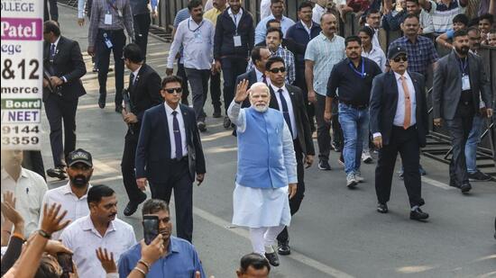 Prime Minister Narendra Modi arrives to vote at a polling booth in Ahmedabad. (PTI) Prime Minister Narendra Modi arrives to vote at a polling booth in Ahmedabad. (PTI)