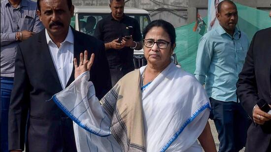 West Bengal chief minister Mamata Banerjee at the Kolkata airport before leaving for Delhi. (PTI)
