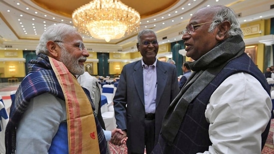 Prime Minister Narendra Modi interacts with Congress president Mallikarjun Kharge during an All-Party Meeting on G20 Summit, in New Delhi on Monday. CPI national general secretary, D. Raja also seen. (ANI Photo) 