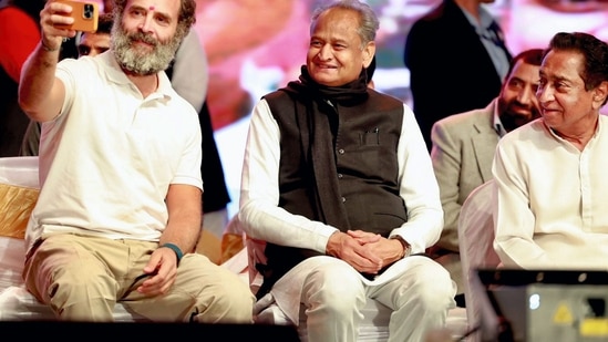 Congress leader Rahul Gandhi takes a selfie with Rajasthan Chief Minister Ashok Gehlot and Madhya Pradesh Congress President Kamal Nath during the Bharat Jodo Yatra, in Jhalawar,(PTI)