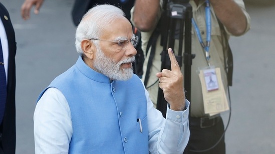 “Cast my vote in Ahmedabad. Urging all those voting today to turnout in record numbers and vote,” PM Modi tweeted in the morning.(PTI)