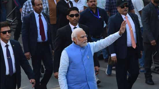 Prime Minister Narendra Modi arrives to vote in Ahmedabad. (AFP)