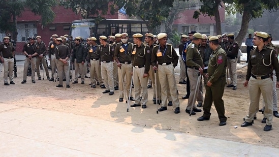 Heavy security presence out side a Polling booth in a Govt School at Chhattarpur Pahari, (area where walker were Murdered ) for elections of the Municipal Corporation of Delhi (MCD) , in New Delhi , India, on Sunday, December 4, 2022. (Photo by Vipin Kumar/ Hindustan Times)