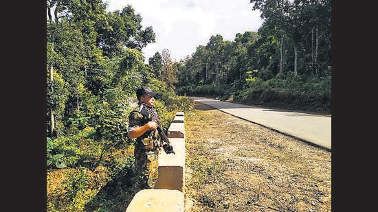 An Assam police officer at the spot of the firing (HT Photo)